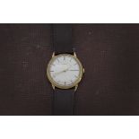 A 1960s 9ct gold cased Jaeger Le Coultre gentleman's wristwatch, silver dial with gilt batons,