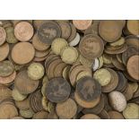 A collection of 20th century British coins, including three pences, pennies, half pennies, and more,