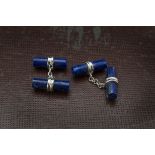 A pair of modern lapis lazuli and silver cufflinks