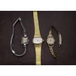 Three ladies watches and two boxes, including a Sandoz, a Cyma and an Ebel, together with a