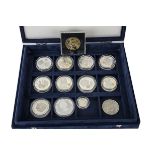 A set of seven modern Royal Mint silver proof commemorative coins, celebrating the Queen's Golden