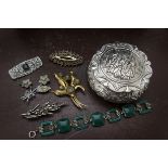 A collection of jewellery, including a silver leaf brooch by T.M & Co, an Art Deco paste set brooch,