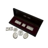 A small group of 1970s silver proof style medallions and ingots, including the Royal Standards three