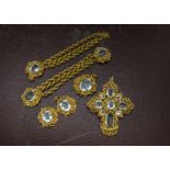 A 19th century part suite of gilt metal and aqua marine jewellery, comprising an ornate filigree