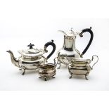 A George V silver four piece tea set from Mappin & Webb, having gadrooned rims and plain bodies on
