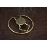 A 9ct gold money clip, circular with arrow head and initial panel centre, hallmarked, 10.2g