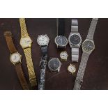 A collection of fifthteen vintage and modern gentlemens wristwatches, including two Roamers, a