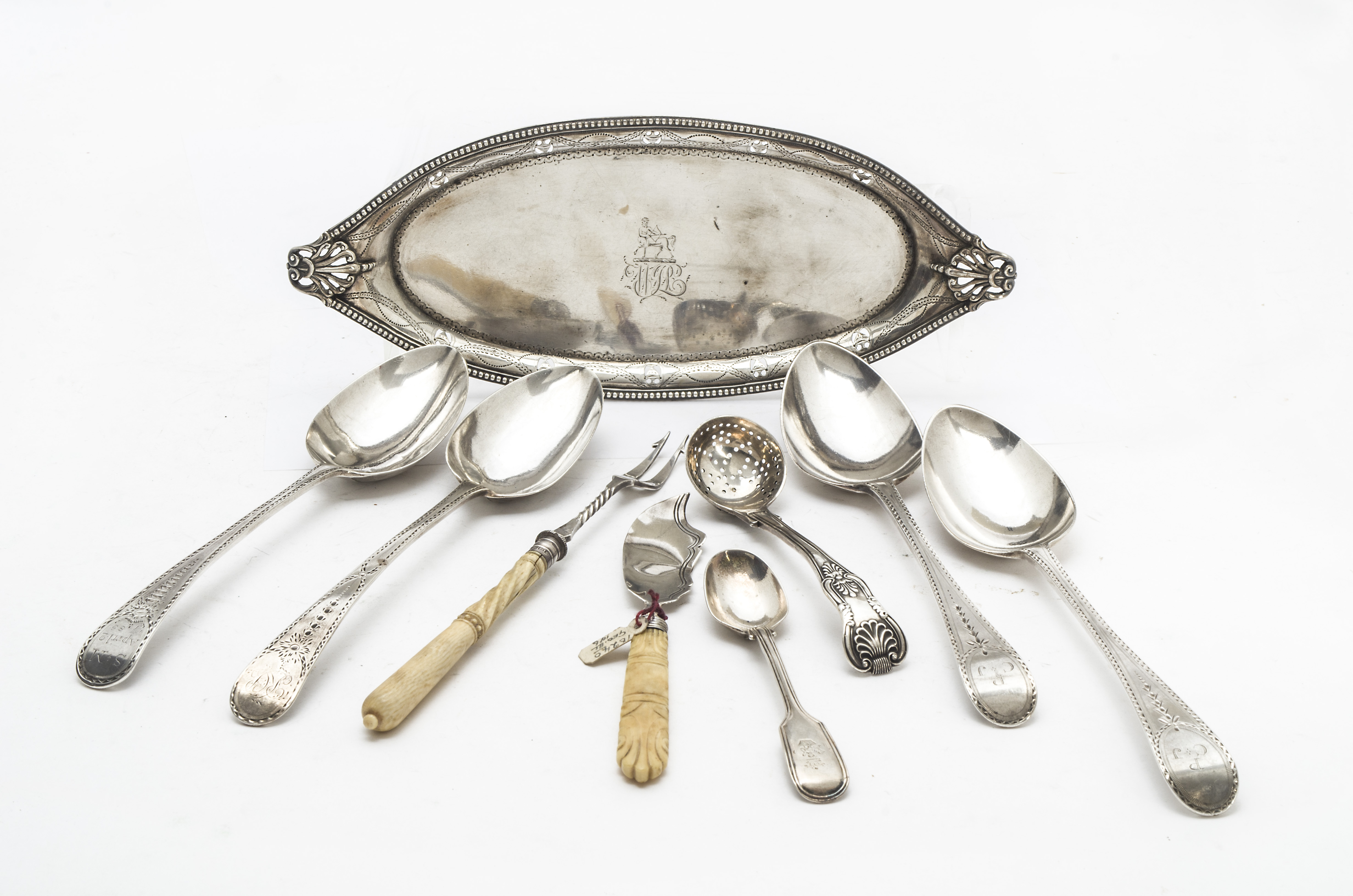 A collection of nine George III and later silver, including four bright cut wedding tablespoons, a