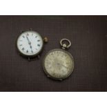 A late 19th century silver open faced lady's pocket watch, together with a later silver trench style