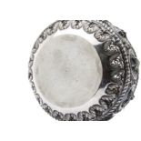 A 19th century Indian silver bowl, having ten circular vignettes with embossed figure on a pierced