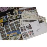 A collection of stamps and related items, including two box files with loose stamps and some FDCs,