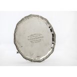 A modern silver presentation salver, marked to Mr & Mrs Calvert from the staff of The African