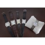 Five modern gentleman's wristwatches, including a Rotary in box with papers, two further Rotary