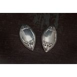 A pair of 1980s silver earrings from Liberty & Co, Celtic design to eliptical panels with clip