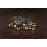 A group of seven gold rings, varying styles each a single and mulitple clear stones, six 9ct gold,