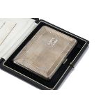 A cased early 20th century Indian white metal presentation cigarette case, in a fitted case, each
