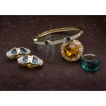 Four items of jewellery from Swarovski, including a large dress ring, bracelet, earrings and another