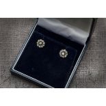 A pair of Antique diamond earrings, the gold and silver cluster mounts set with old cuts, 1.8g and
