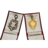 An Edwardian 15ct gold fob medallion, 7.7g, together with another similar silver example, both