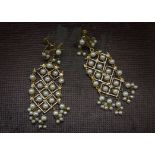 A pair of vintage gilt and pearl chandelier earrings, star screw back supports with grid set with