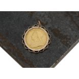 A Victorian full sovereign in pendant mount, the yellow metal circular mount supporting a 1900 dated