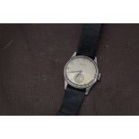 A 1950s Longines stainless steel gentleman's wristwatch, Arabic gilt numerals to silvered dial