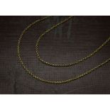 A late Victorian 9ct gold muff chain, opera length with watch snap clasp marked 9ct, 12g