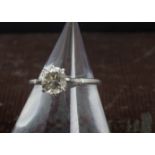 An Edwardian diamond solitaire engagement ring, the platninum mount with eight claw setting for an