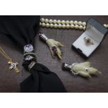 A collection of costume jewellery, including many fashion dress rings, a gold plated locket,