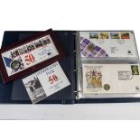 A collection of Royal Mail and Royal Mint philatelic numismatic covers, in blue folder, together
