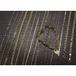 A good collection of 9ct gold and yellow metal necklaces and bracelet, varying designs, most