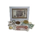 A collection of coins and bank notes, including several silver proof coins, some boxed, other