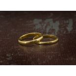 Two vintage 22ct gold wedding bands, both plain, hallmarked, 5.3g (2)