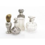 An Art Deco period silver shaving brush, together with a cut glass and silver mounted scent bottle