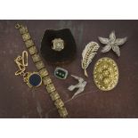 An interesting collection of jewellery and other items, presented in two jewellery box trays,