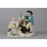 A Derby Porcelain Figurine Group of a Peepshow Man, numbered 94 on the base, it was first produced