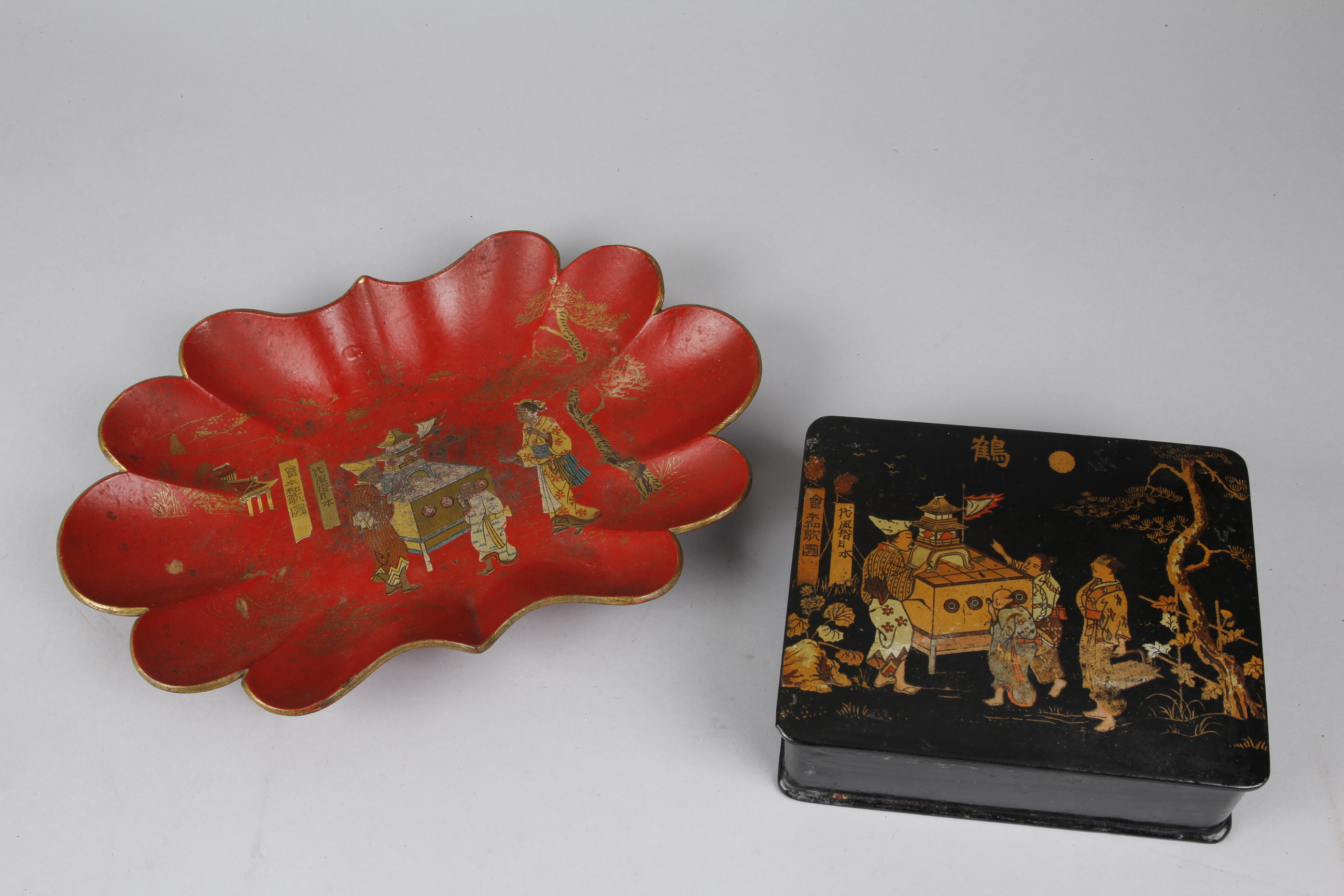 Two Lacquered Articles with Images of Peep Shows, one a red tray with curved borders; and the other,