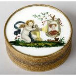A Rare French Porcelain Powder or Bon Bon Box, the decorated porcelain top depicting a kneeling