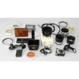 Leica Lenshoods, an IUFOO in box, a SOOMP and others, a 14284 motor bracket, a NIKON Rangefinder