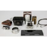 Leica Accessories, an ADVOO in ASKOO, a SOOMP lens hood with other items and a Tewe 35-200