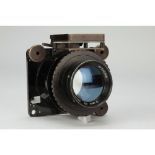 Taylor Hobson 4 inch F2 Lens, No 576568, possibly from a Vinten F95 Aerial camera, with flip up