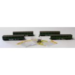 Tri-ang 00 Gauge 4-Car EMU, repainted light green, with four packs of South Eastern Diecast flush