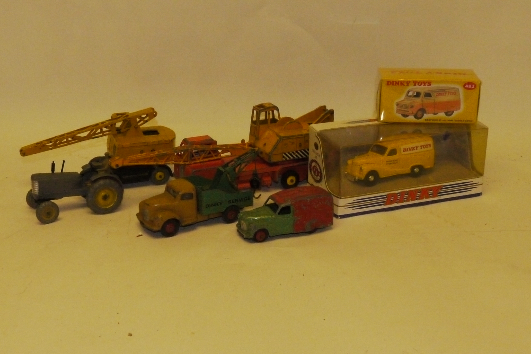 Dinky Toys, Three boxed examples including 971 Coles Mobile crane, modern 1953 Austin A40 and modern