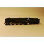 A Hornby Dublo 00 Gauge 2-Rail BR green West Country Class 'Barnstaple' locomotive, with an