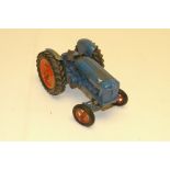 A Chad Valley Fordson Major Tractor, in blue livery with rubber tyres, F, play worn