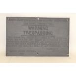 A Reproduction Cast-Iron SE&CR 'Trespassing' Warning Notice, unpainted, measuring 26" x 16", F-G,