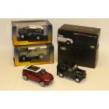 Land Rover and Range Rover, all boxed 1:18 scale including Kyosho green Defender 90, Gt Autos