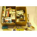 Quantity of boxed Toys various examples including a number of tin clockwork models, plastic toys,