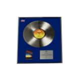 Judas Priest, an original BPI silver disc award presented to Dave Holland, the bands drummer 1979-