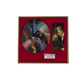 David Bowie / Picture Disc, a framed Picture Disc of the Lets Dance LP together with pages from a CD